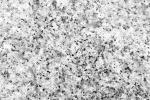 PLENSCO ornamental granite collection - Light speckled mineral gray texture background
